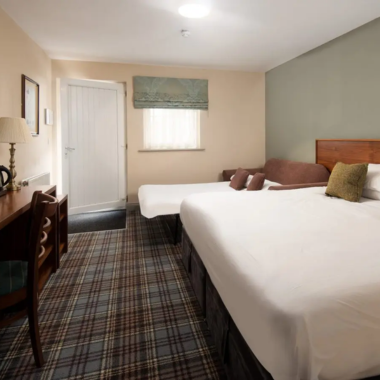 Family bedroom along Northumberland's golf coast